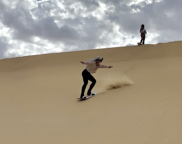 Optional sandboarding on the dunes