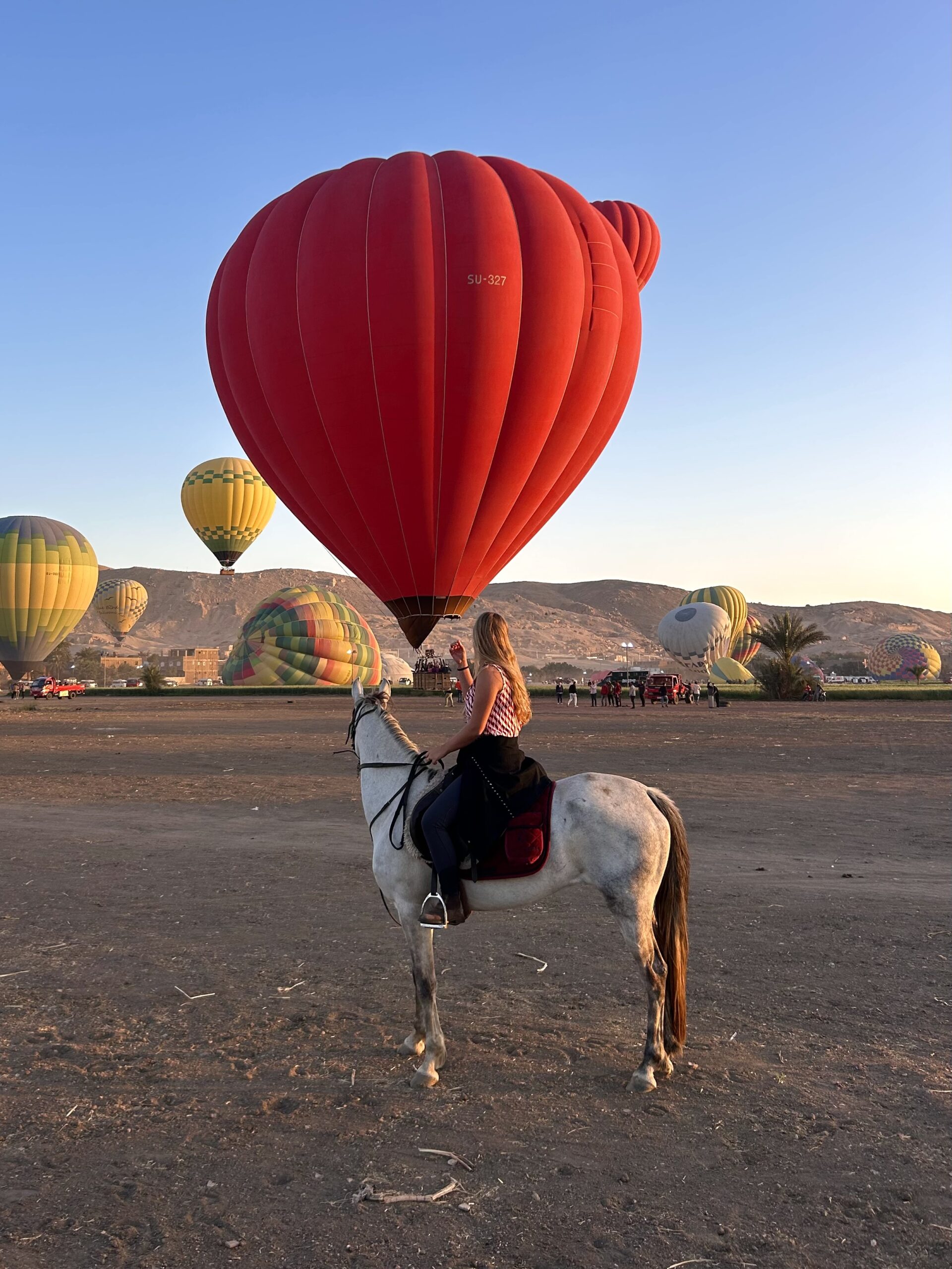 Dawn ride beneath hot-air balloons